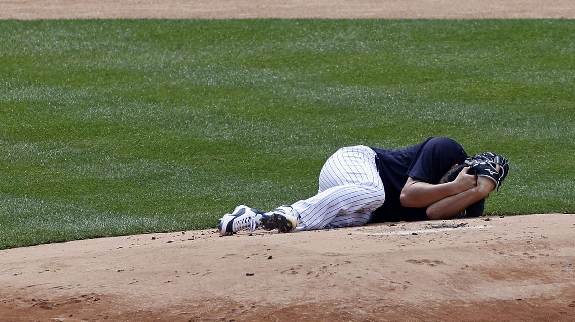 Yankees pitcher Tanaka hit in head by Stanton line drive