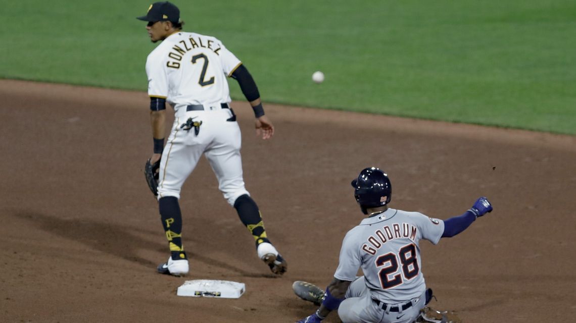 Tigers outslug Pirates 17-13 in 11 innings after layoff