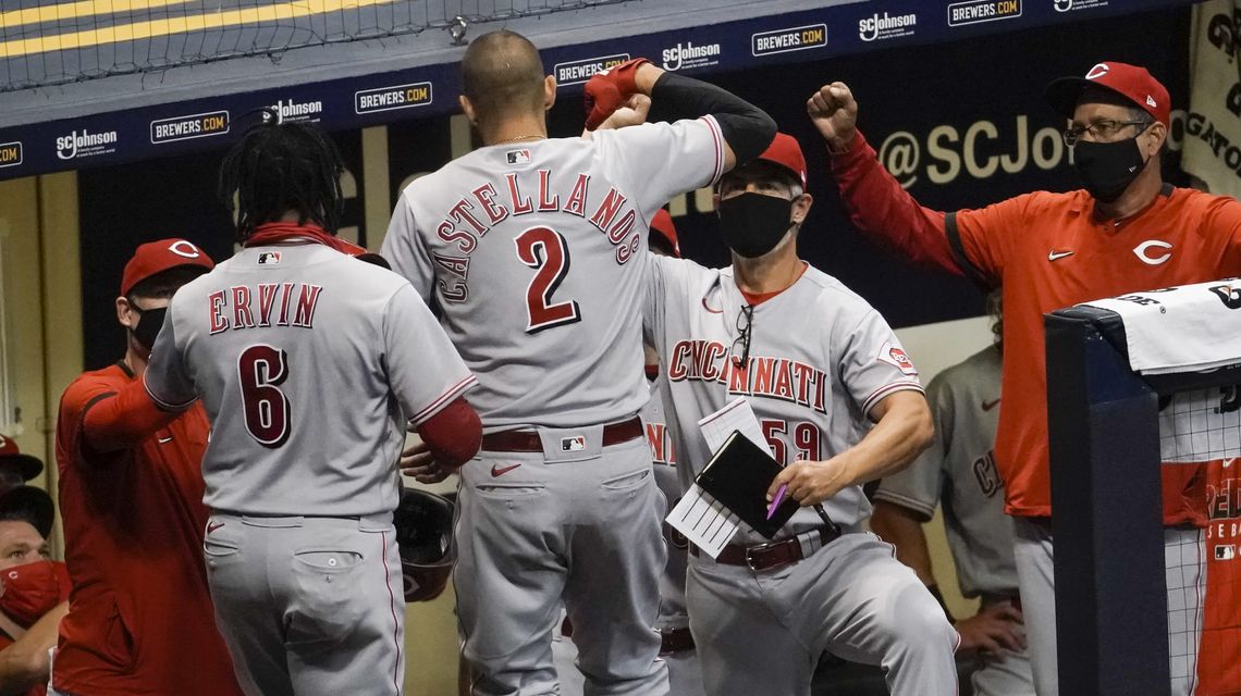 Bauer strikes out 12 as Reds defeat Brewers 8-3