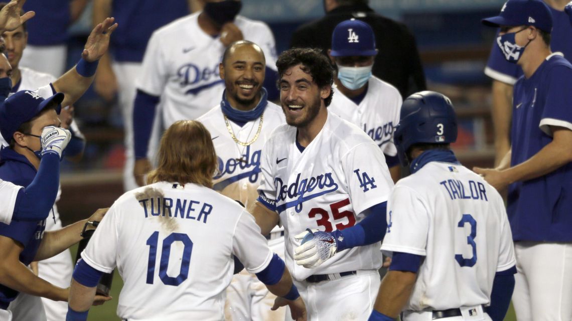 Dodgers reach halfway point with baseball’s best record