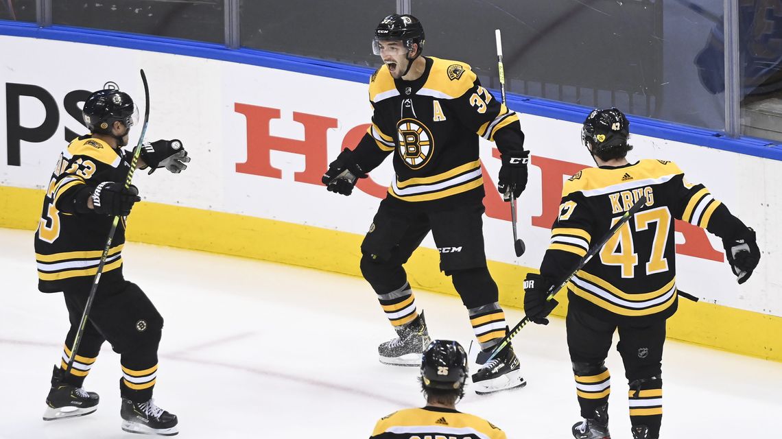 Bergeron scores in 2nd OT, Bruins beat Hurricanes in Game 1