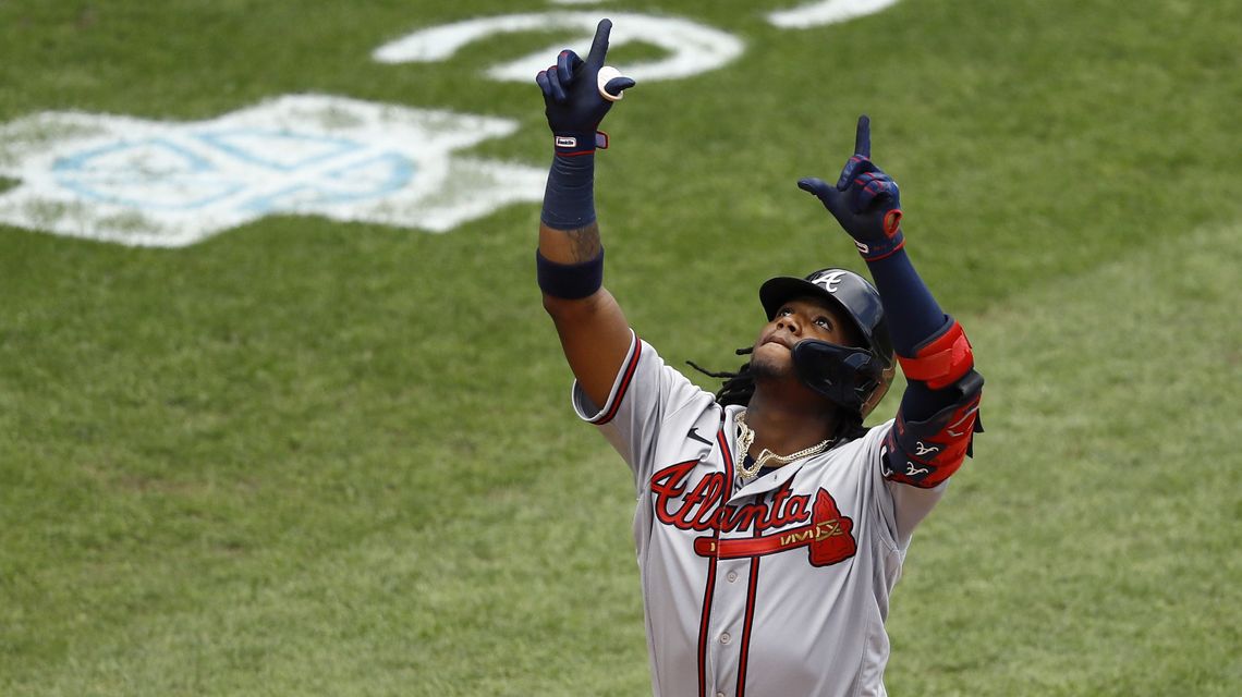 Acuna homers to lead Braves past Phillies 5-2 in first of 2