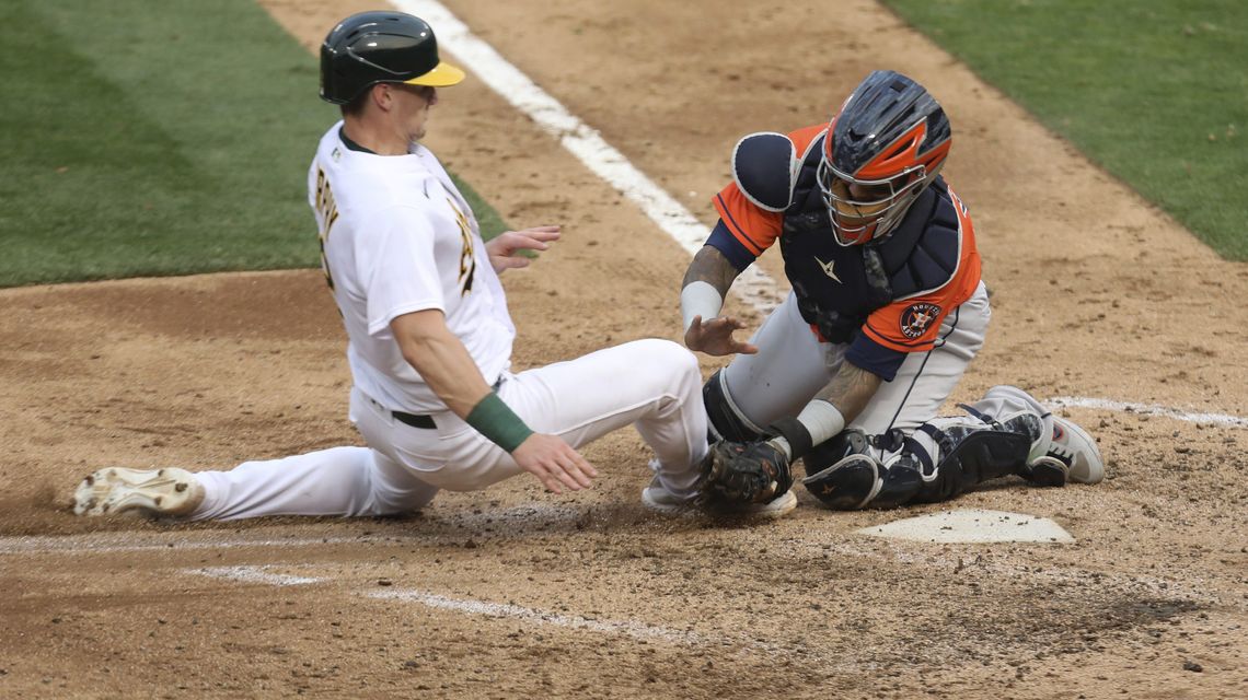 Davis, A’s hand Greinke, Astros 6th straight loss in Game 1