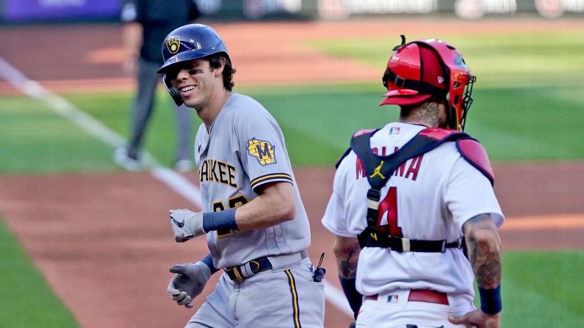 Yelich homers, Brewers beat Cards in key doubleheader opener