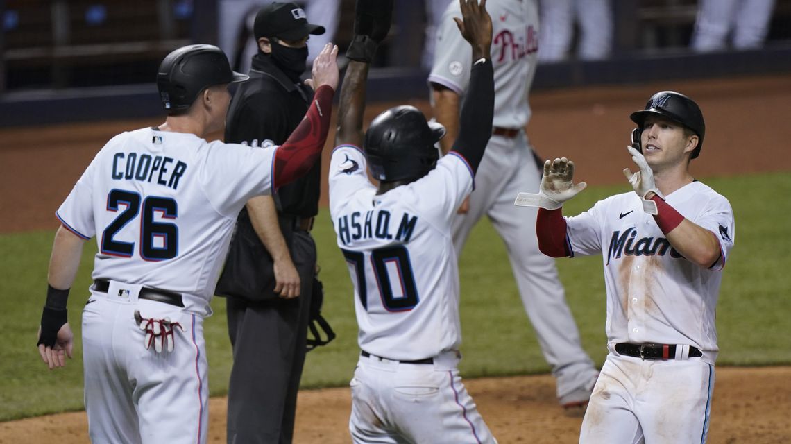 Marlins rally past Phils, open 1st 7-game series since ’67