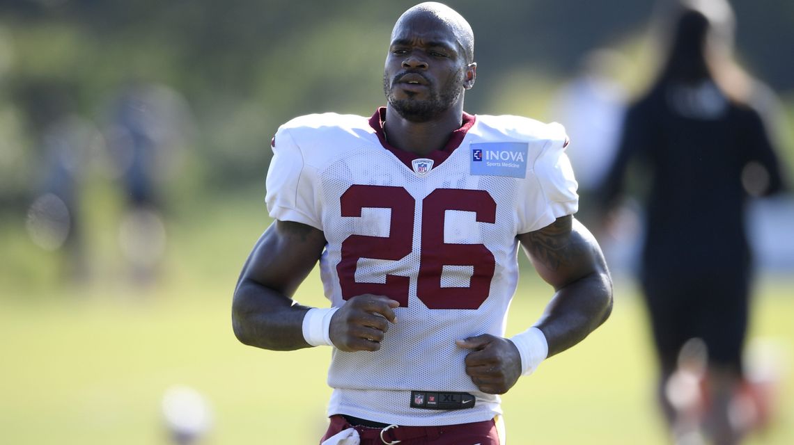 Washington releases Adrian Peterson, turns to young backs