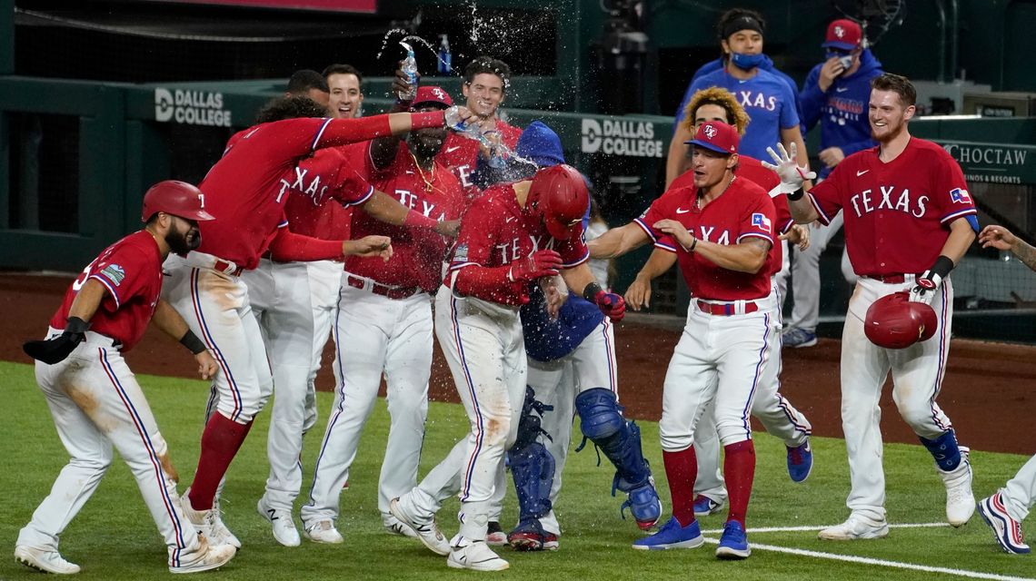 Rangers keep Astros waiting for playoffs with 5-4 win in 10