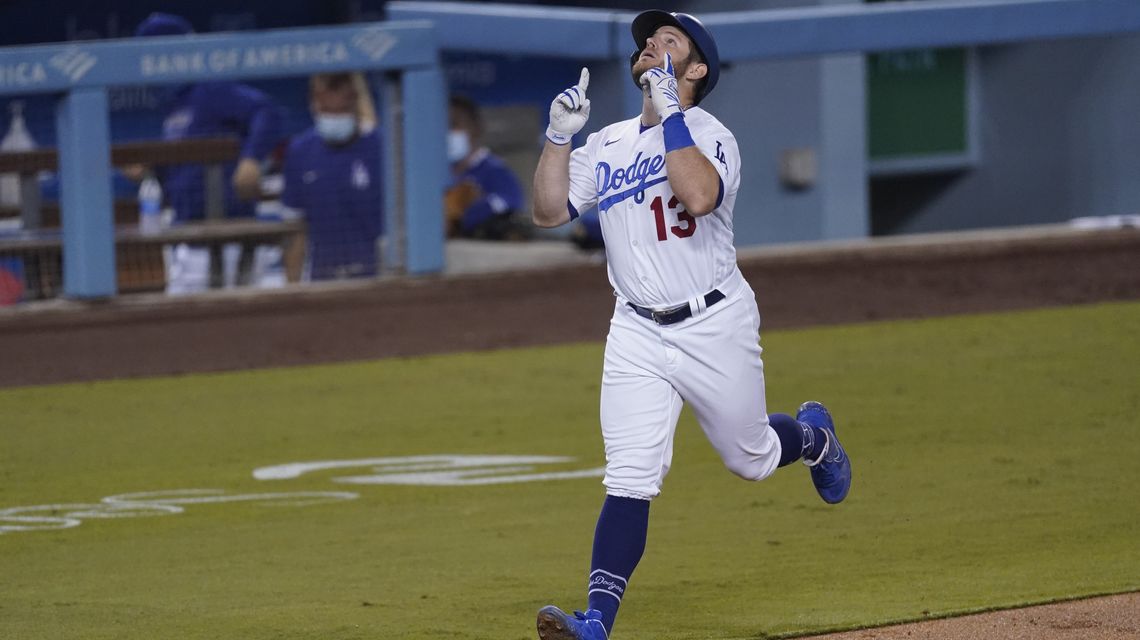 Dodgers clinch NL’s top seed, West title with win over A’s
