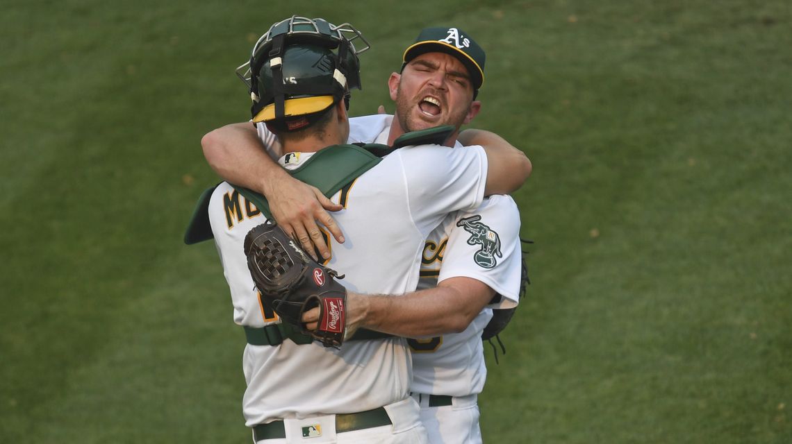 Pinder delivers timely hit, A’s advance in playoffs at last