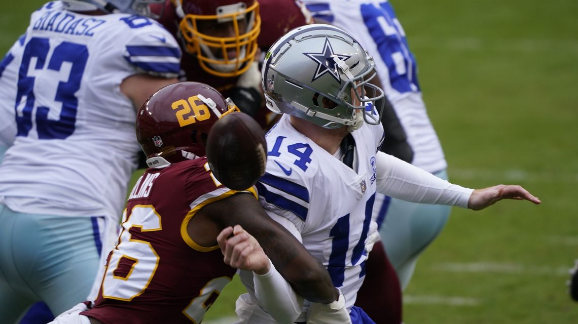 Dalton hurt, Washington defense clamps down to beat Cowboys