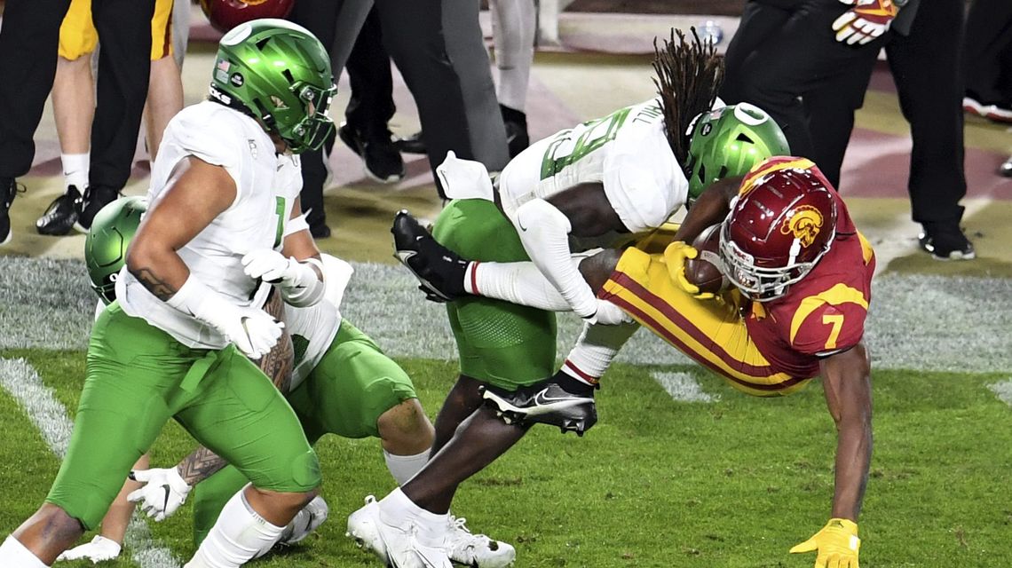 Oregon holds off USC late, grabs Pac-12 title with 31-24 win