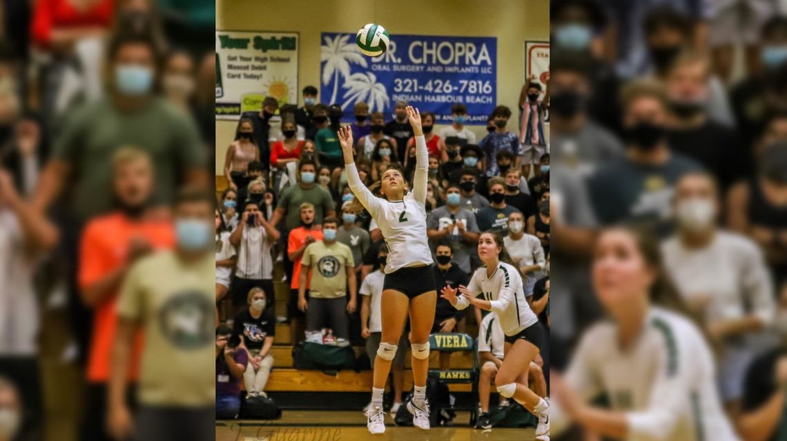 Kelly Merz heats up the court with her volleyball skills for Viera High School