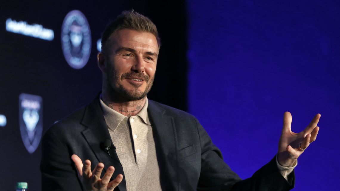 Beckham says Neville hired as coach on merit, not friendship