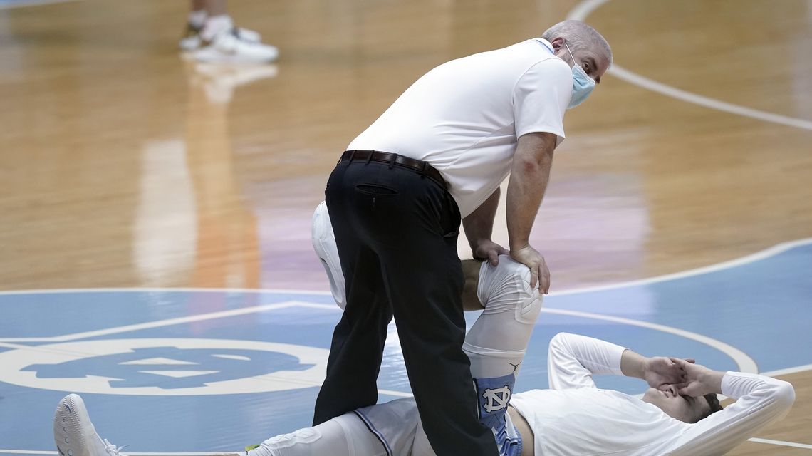 Athletic trainers adapt to chaos of sports in a pandemic