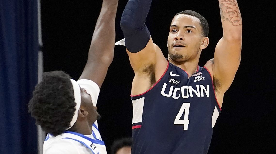 Unexpected win has UConn fans downing hot sauce for charity