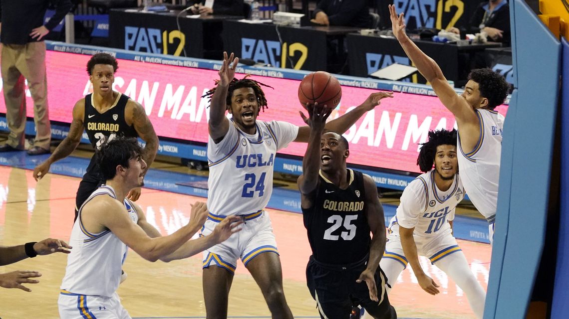 UCLA holds off Colorado 65-62 for 13th straight home win