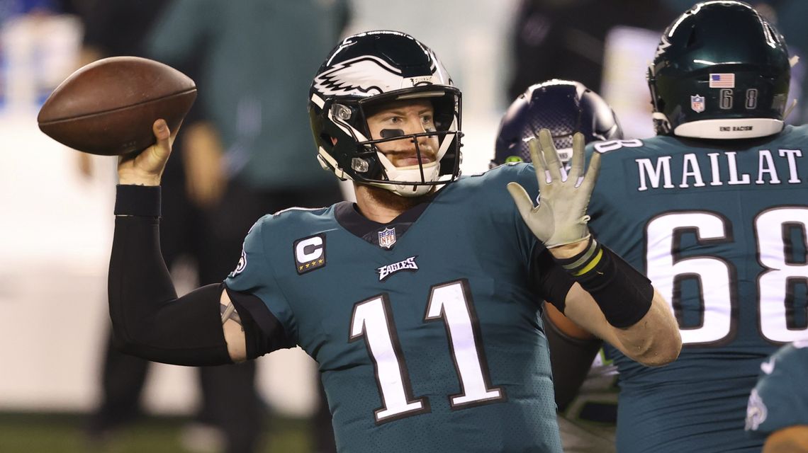 AP source: Eagles send Carson Wentz to Colts for draft picks