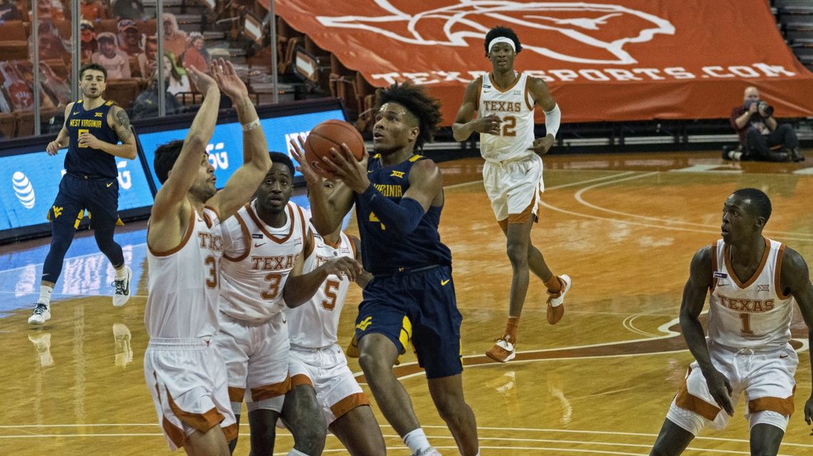 No. 13 West Virginia rallies from 19 down, tops No. 12 Texas