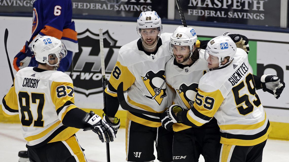 Letang scores late in OT, Penguins beat Islanders 4-3
