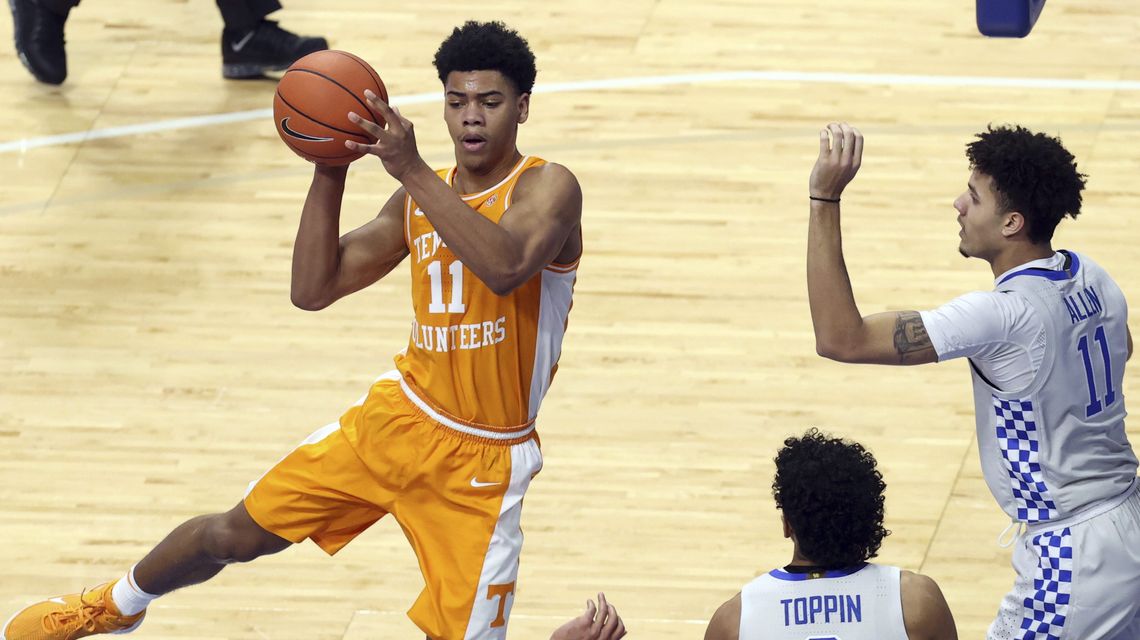 Johnson, Springer rally No. 11 Tennessee past Kentucky 82-71