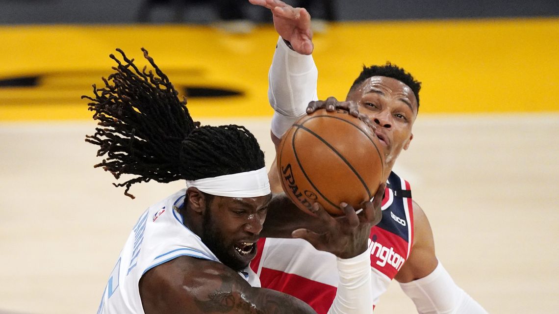 Wizards win 5th straight, hold off Lakers 127-124 in OT