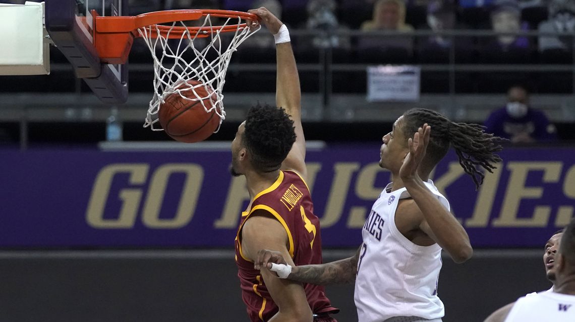 Mobley brothers carry No. 20 USC past Washington, 69-54