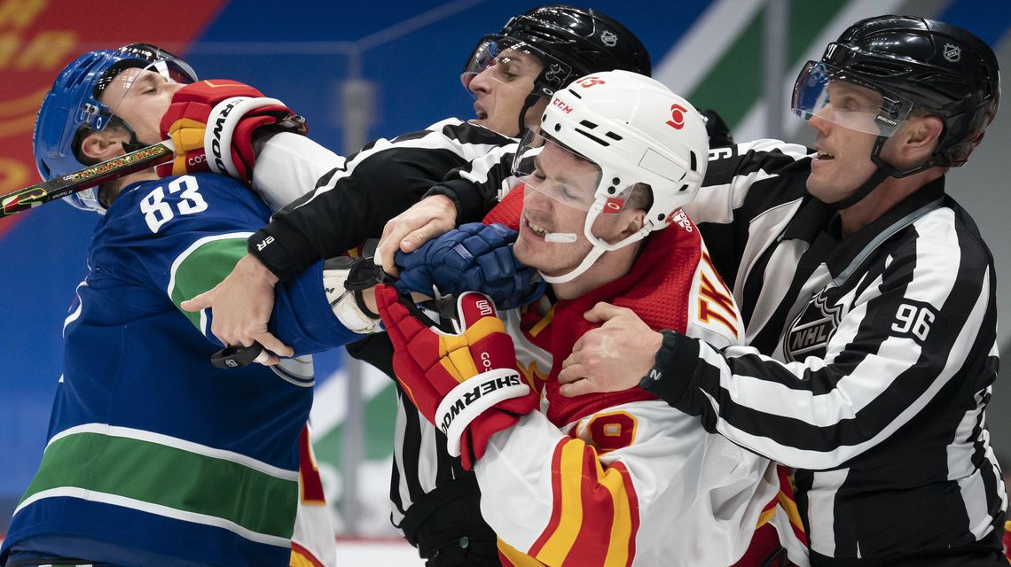 Flames hand Canucks 6th straight loss in series opener