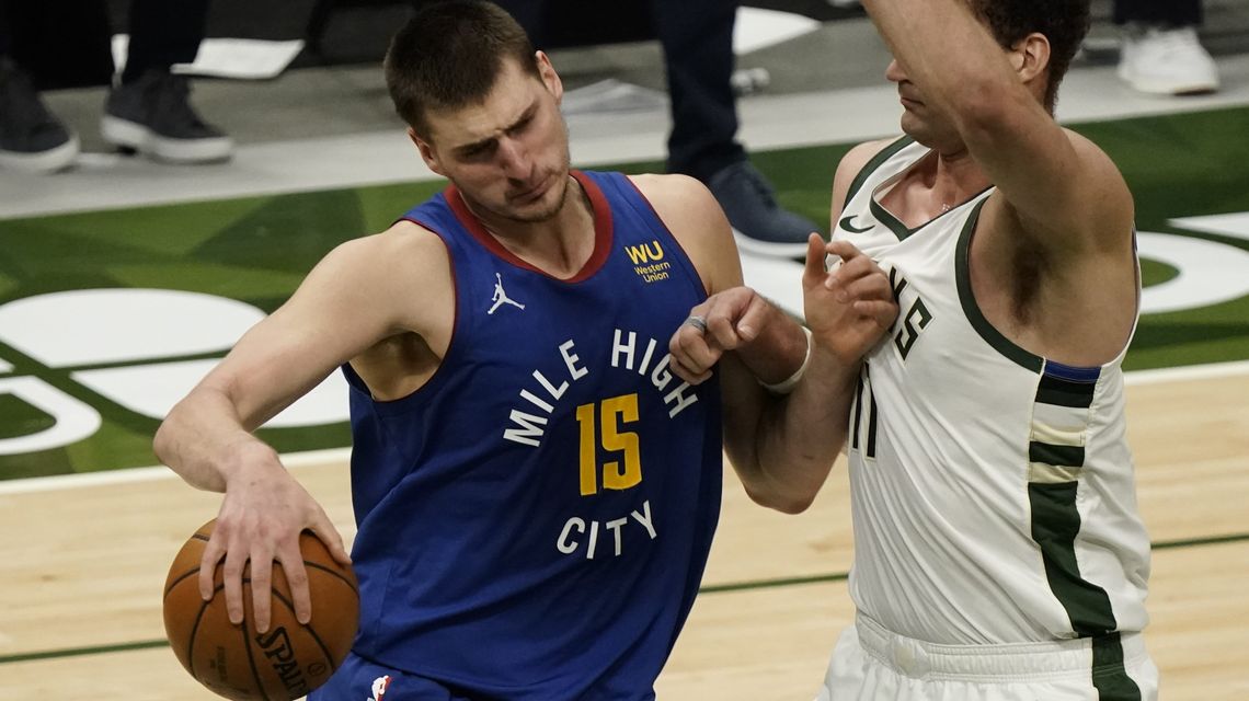 Jokic’s triple-double leads Nuggets to 128-97 rout of Bucks