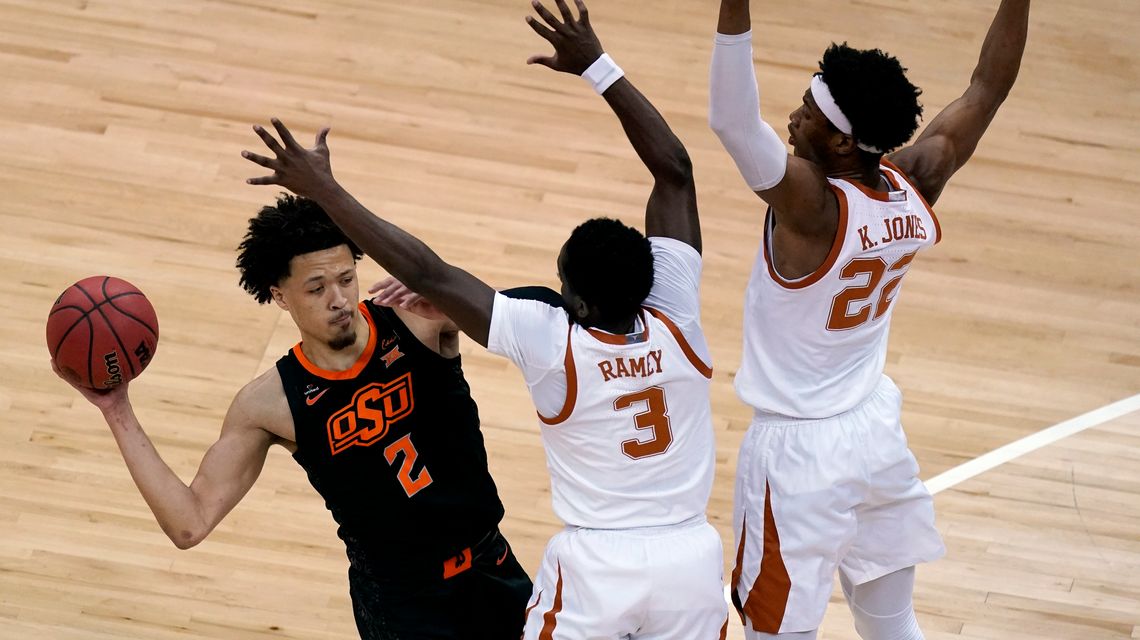 No. 13 Texas beats No. 12 Oklahoma St for first Big 12 title