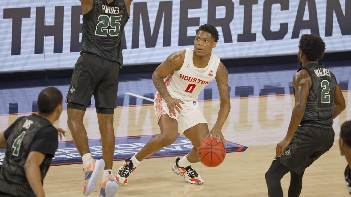 No. 7 Houston eases past Tulane 77-52 in American quarters