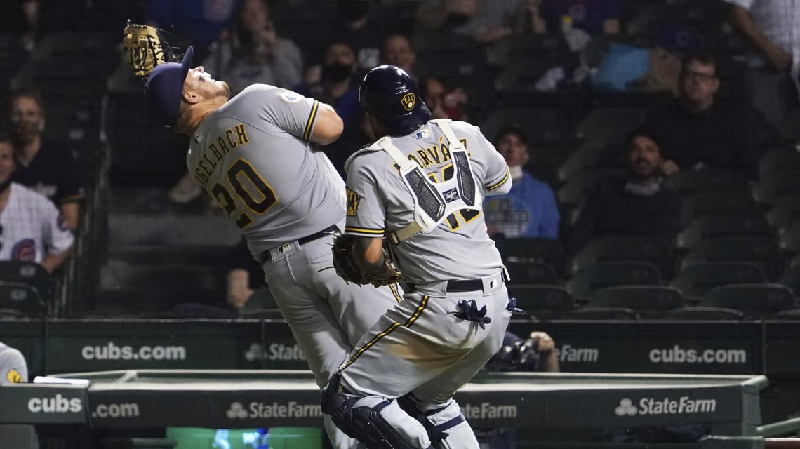Peralta pitches 5 innings as Brewers blank Cubs 4-0