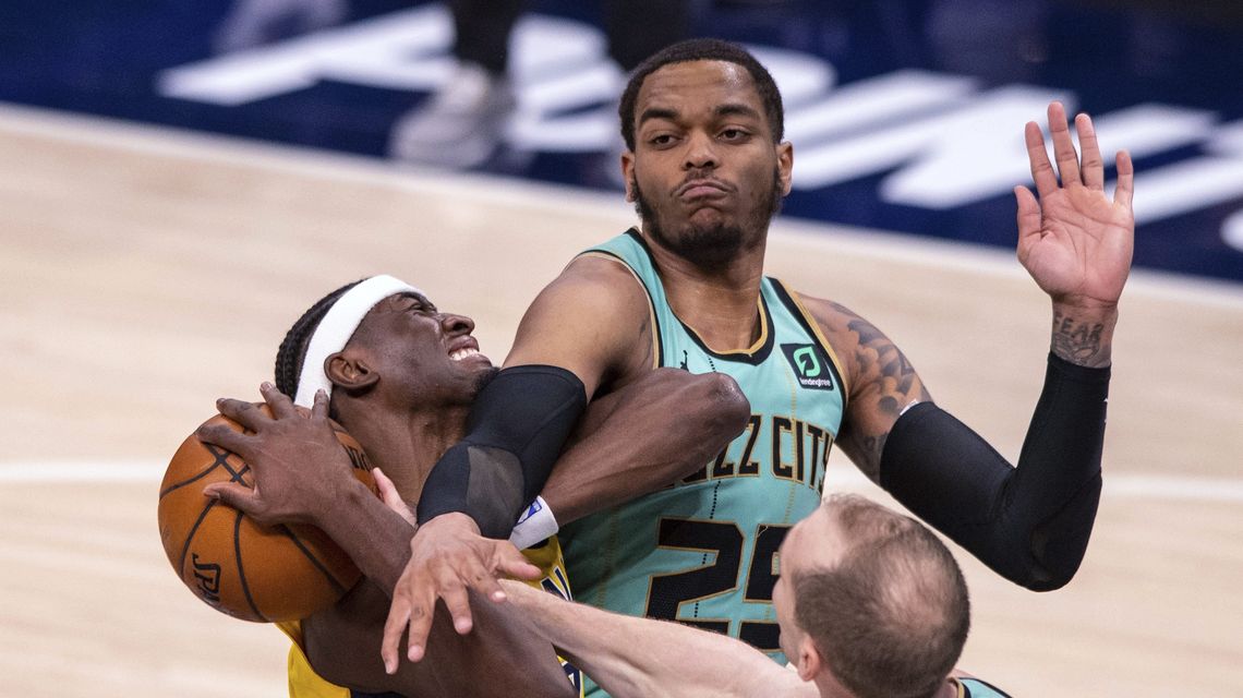Short-handed Hornets rout slumping Pacers 114-97
