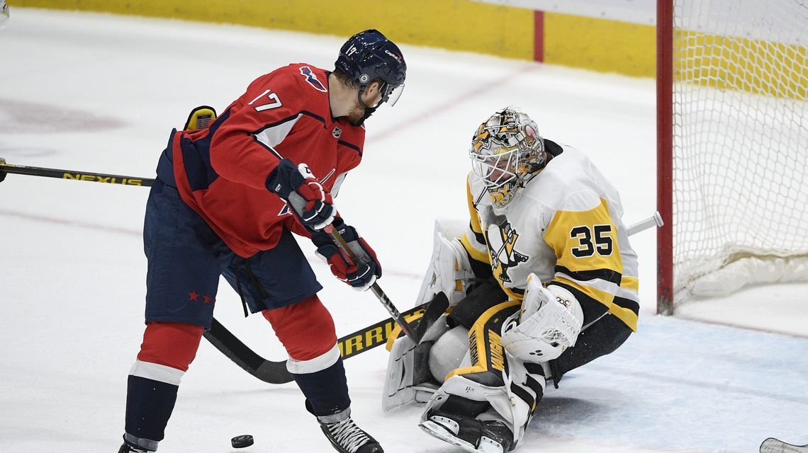 Guentzel wins it in OT as Pens, Caps clinch playoffs
