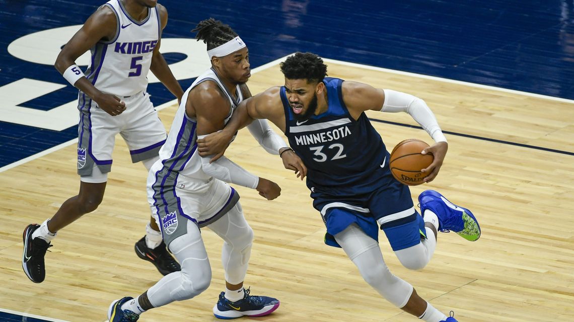 Russell returns with 25 points; Wolves beat Kings 116-106