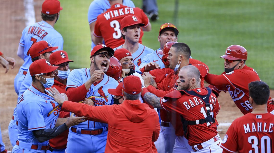 Reds, Cards scrap at plate and outfield, Castellanos tossed