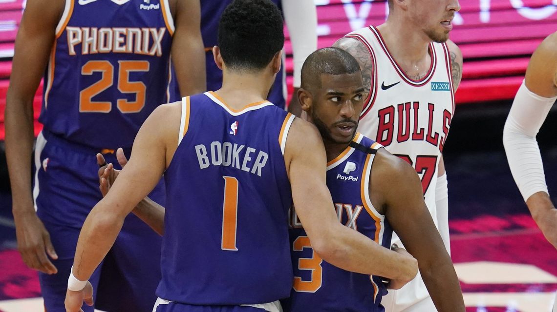 Booker scores season-high 45, Suns beat Bulls 121-116