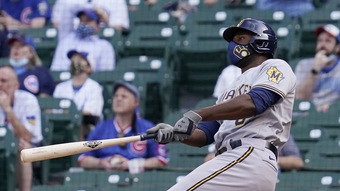 Cain 2 HRs, Woodruff sharp, Brewers beat Cubs 4-2 in 10