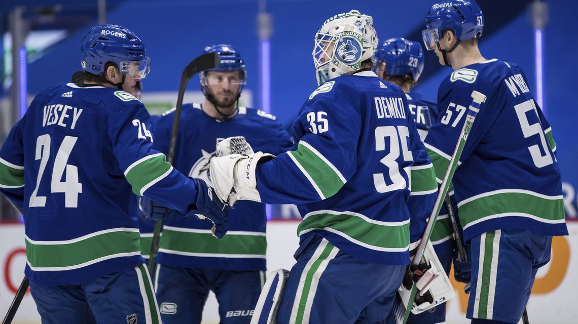 Demko makes 38 saves and Canucks top Flames 4-2