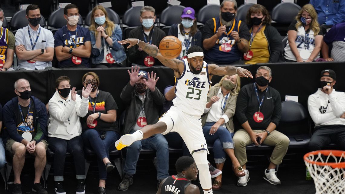 NBA-leading Jazz beat Rockets 124-116 for 50th victory