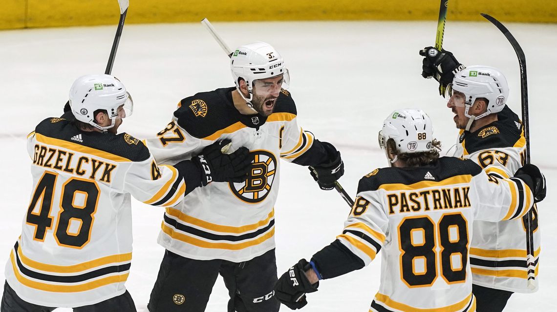 Marchand scores in OT, Bruins beat Capitals to even series