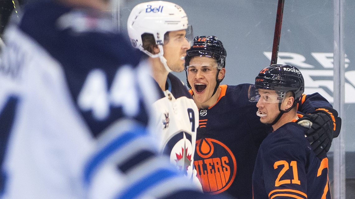 Helleybuyck makes 32 saves, Jets beat Oilers 4-1 in Game 1