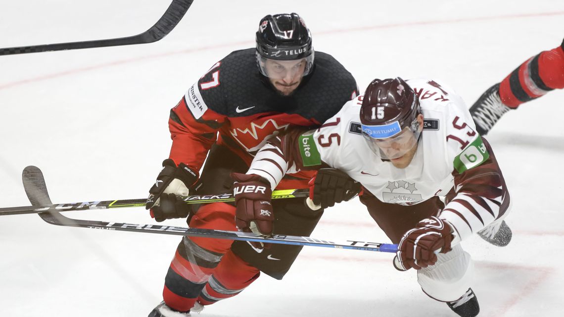 Host Latvia beats Canada 2-0 in world hockey opener