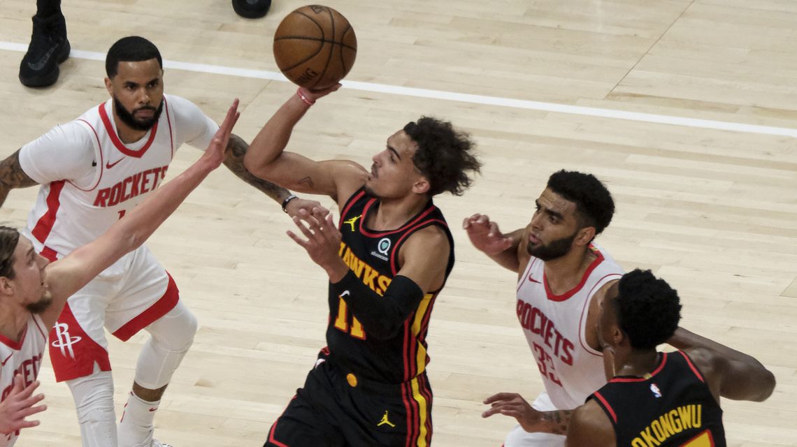 Hawks head to playoffs after 124-95 rout of woeful Rockets