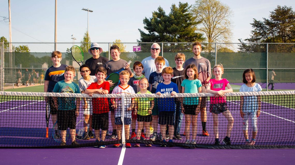 Coach Rob Balge teaches life lessons to youth tennis players while out on the court