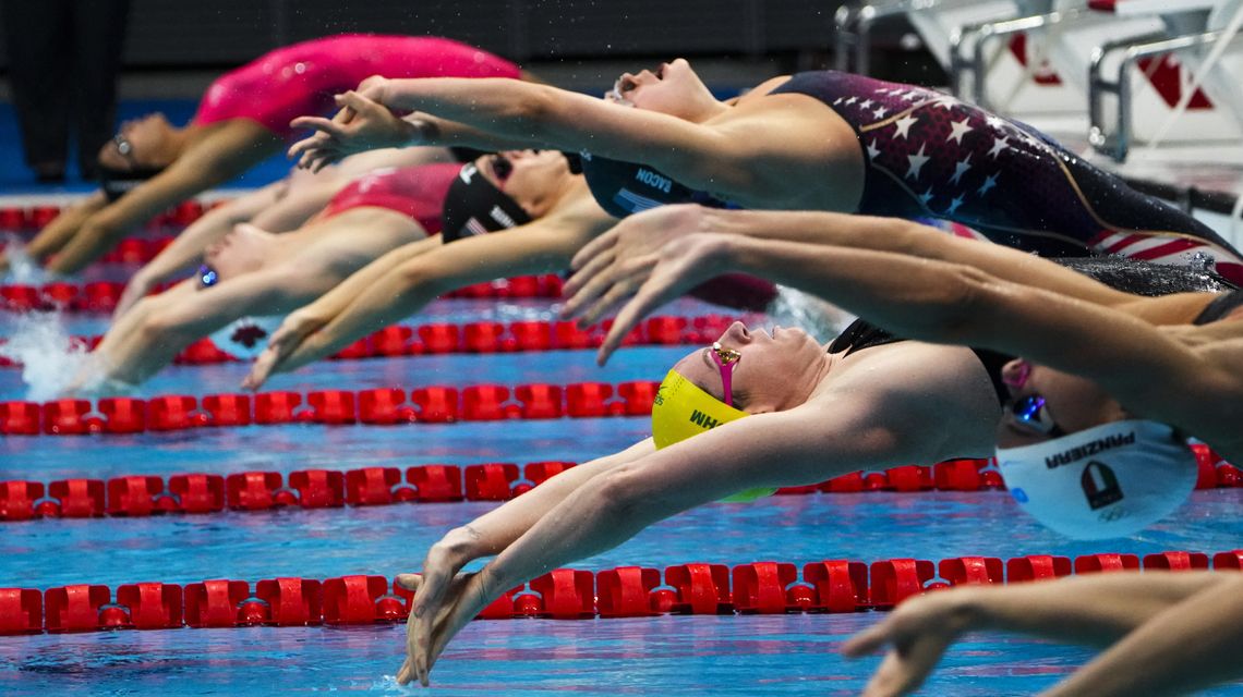 GLIMPSES: Olympic swimmers, reaching for victory