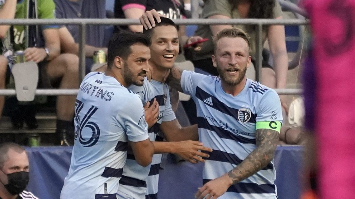Sporting KC beats Sounders 3-1 to pull closer in West