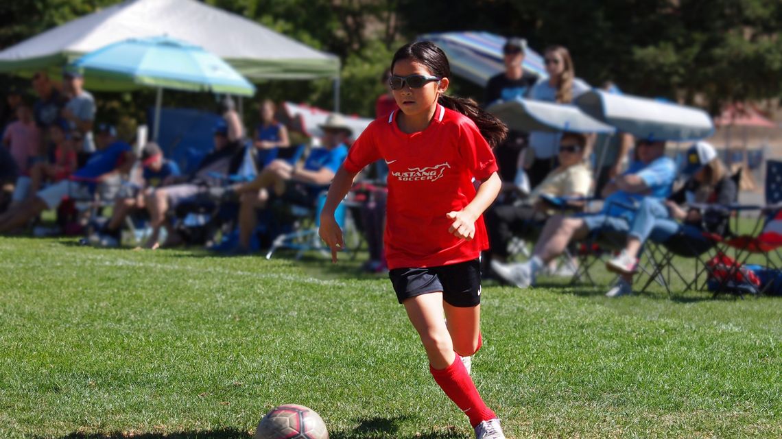 Mustang youth soccer club player takes on challenges for charity BVM