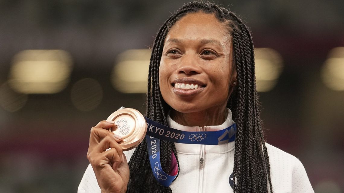 Allyson Felix of the US wins bronze in the 400 meters, her 10th Olympic medal, the most for any woman in track history