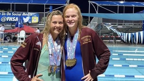 Summer Cardwell and Gisella Wright lead Countryside High School in the Pinellas County Aquatic Championship