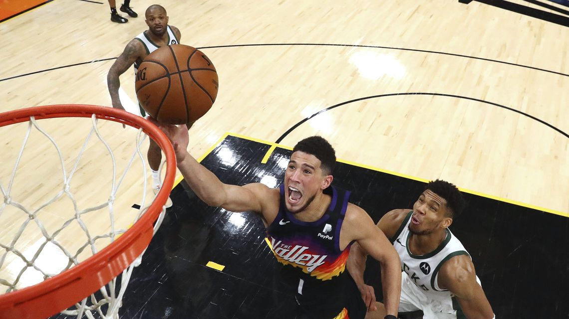 Suns’ Booker will miss start of camp due to health protocols